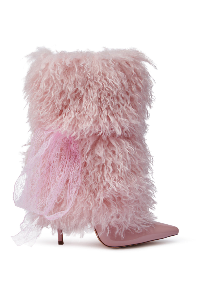 Introducing the AZALEA WANG JUNIPER PINK FUR BOOTIE, featuring a pointed toe and stiletto heel. This whimsical bootie is adorned with a large, delicate pink lace bow on the side, seamlessly blending its fluffy texture with a sleek design for a bold and imaginative style statement.