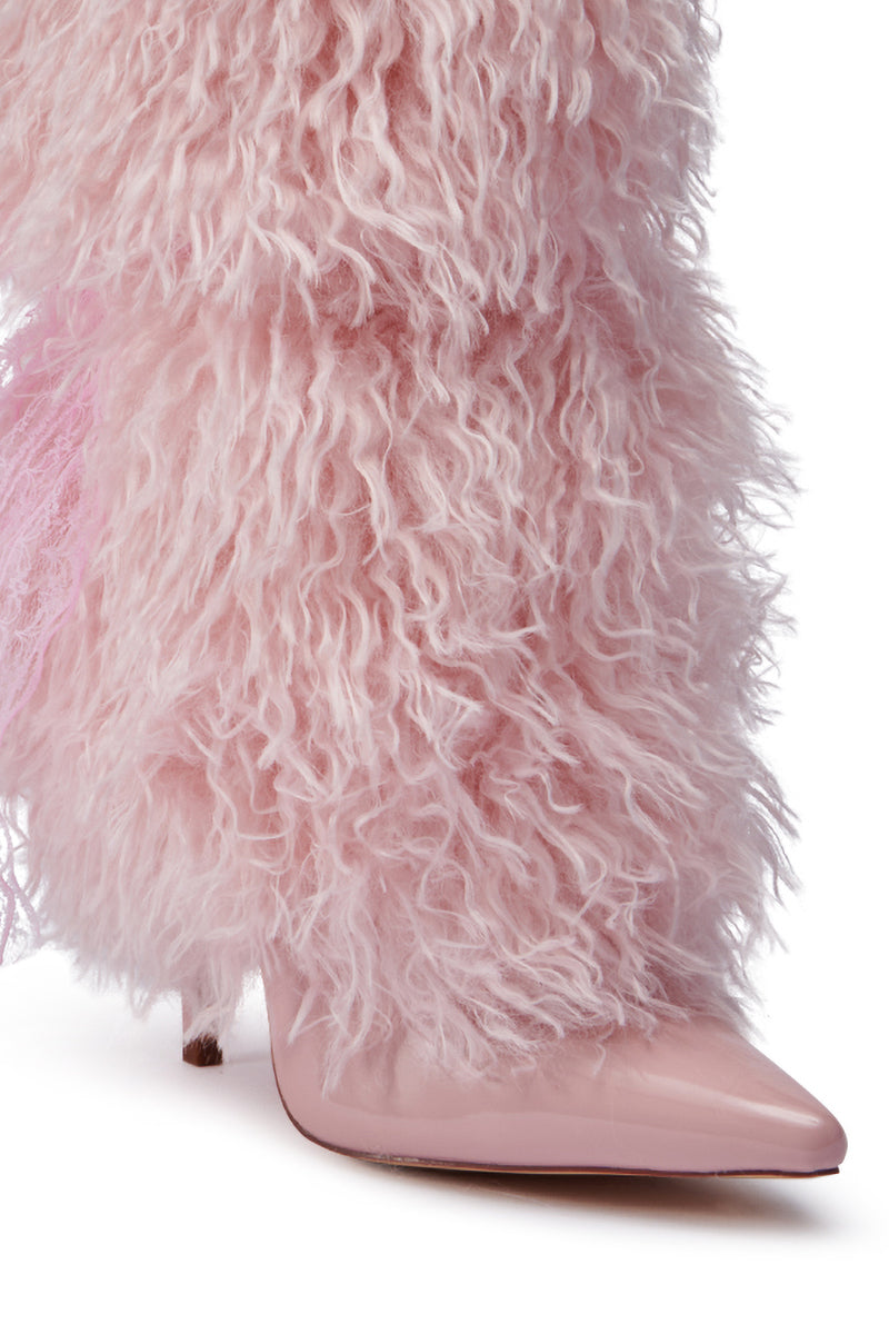 Close-up of the AZALEA WANG JUNIPER PINK FUR BOOTIE featuring a pointed toe enveloped in fluffy, curly pink fur. The voluminous and soft texture makes a bold fashion statement, beautifully complemented by its sleek stiletto heel.