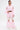A woman with short hair confidently poses against a white background in the CANDY LACE TRIM WINDBREAKER, featuring pale pink fabric, lace details, sheer sleeves, and layered ruffles for an ultra-kawaii look.
