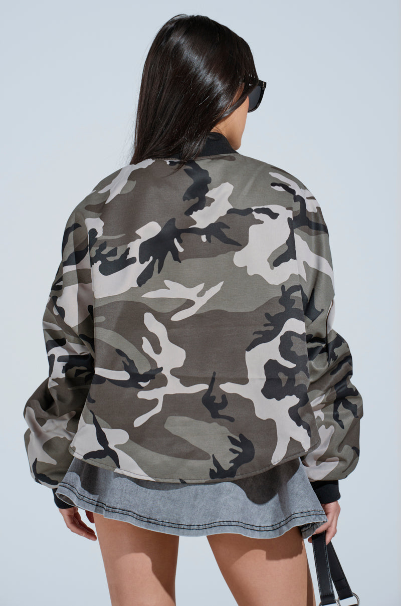 ON THE RUN CAMO SHRUG – AKIRA