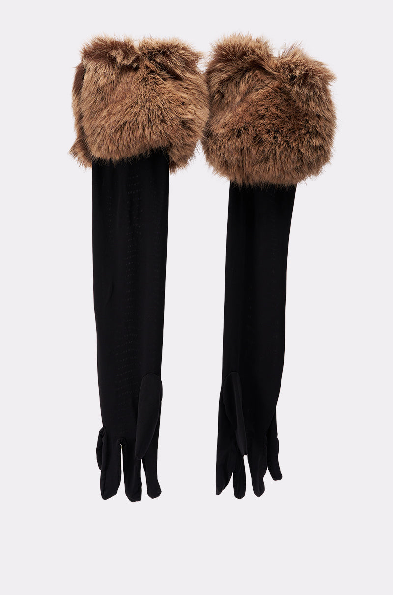 The SO CHIC BLACK GLOVES are elegant evening gloves with thick brown faux fur cuffs at the wrists, showcased against a plain light background. 2