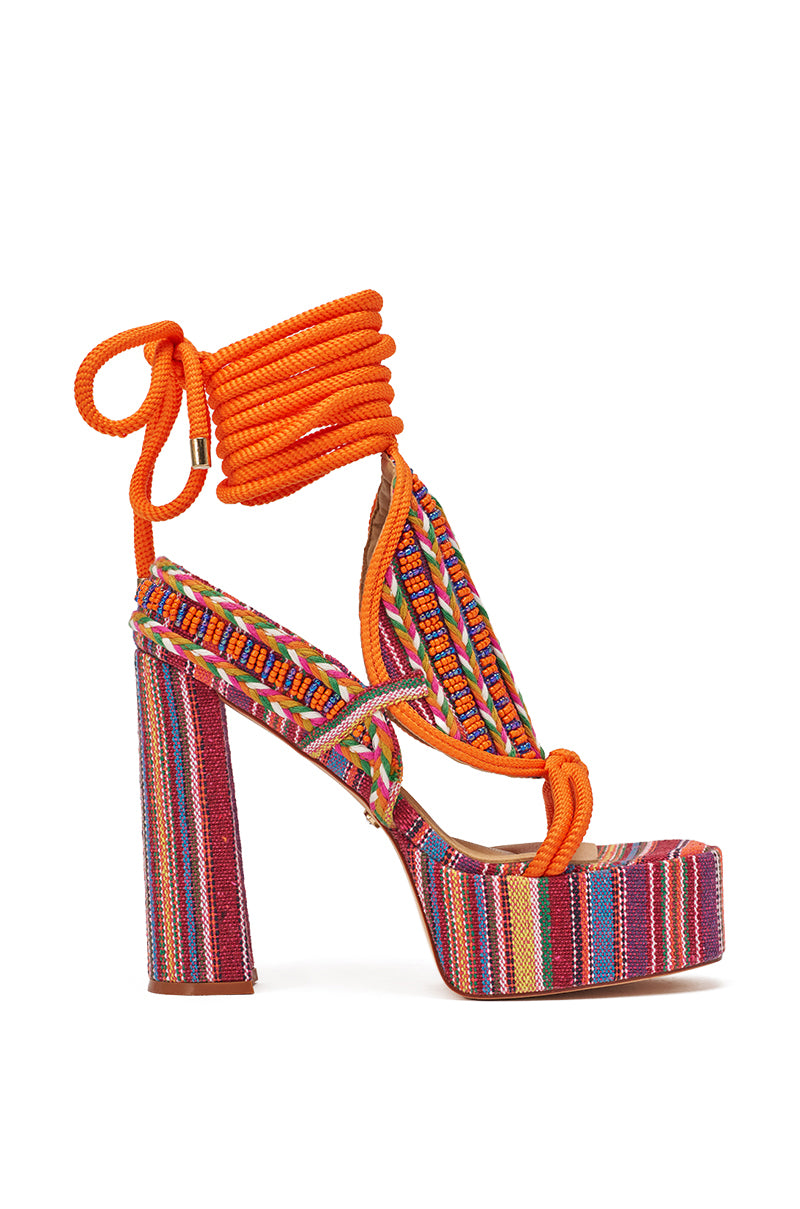 The AKIRA GOLD KALINA MULTI CHUNKY BEADED SANDAL is a vibrant boho-chic platform with a chunky block heel, featuring multicolored beaded details and vivid orange wrap-around ankle laces. 4