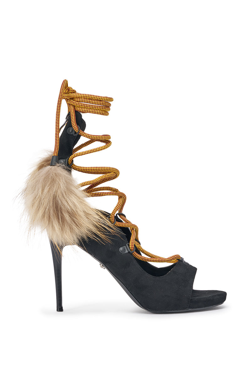 The AKIRA GOLD KARLA OLIVE FAUX SUEDE FUR EMBELLISHED STILETTO is a unique olive strappy stiletto with open toes, orange cord lace-up heel wraps, and tan faux fur embellishment on the side. 3