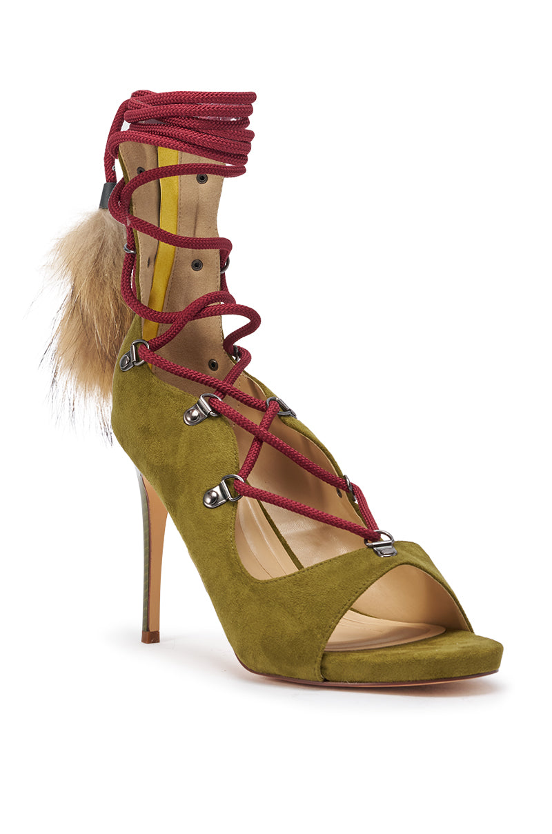 The AZALEA WANG KARLA Olive Faux Suede Fur Embellished Stiletto Sandal features red hiking-style laces, metal eyelets, a stiletto heel, open toe, and a brown faux fur accent at the heel. 5