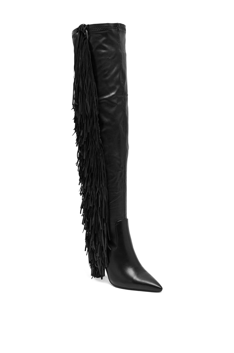 The AZALEA WANG KATRICIA BLACK FRINGE CHUNKY BOOT is a black knee-high, pointed-toe boot crafted from supple vegan leather with decorative fringe on the outer side—perfect for anyone seeking stylish black fringe boots. 4