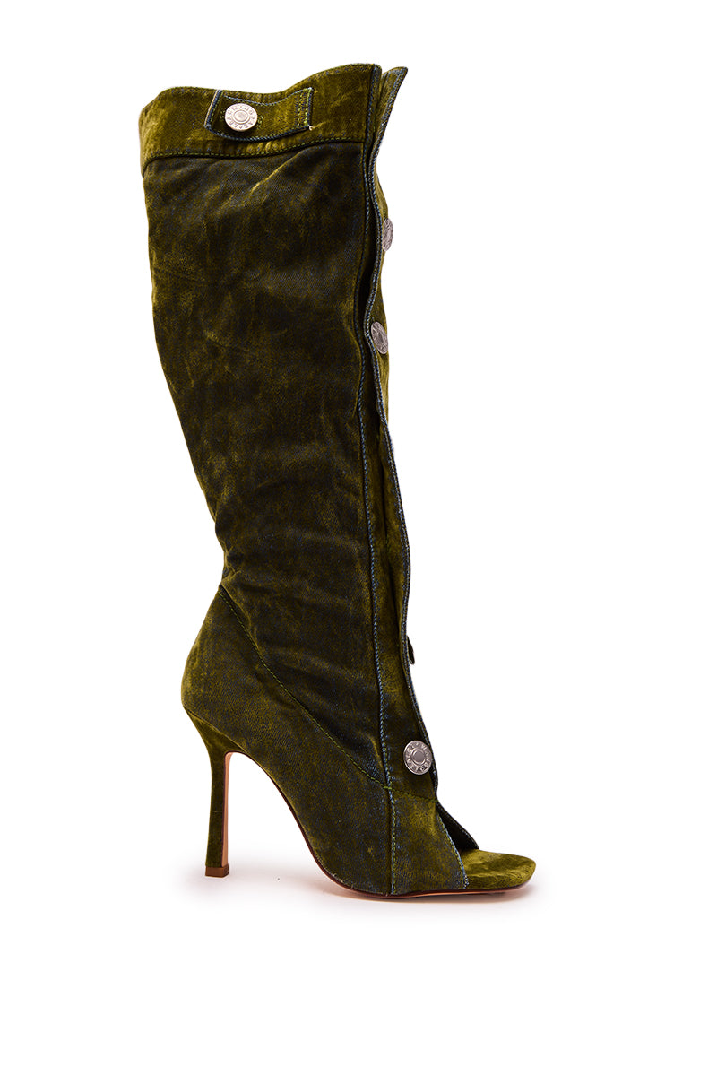 The AZALEA WANG KAZUKI Olive Slouchy Denim Boot features an olive green denim design, knee-high slouchy shaft, decorative silver buttons down the front, open toe, and a slim stiletto heel.