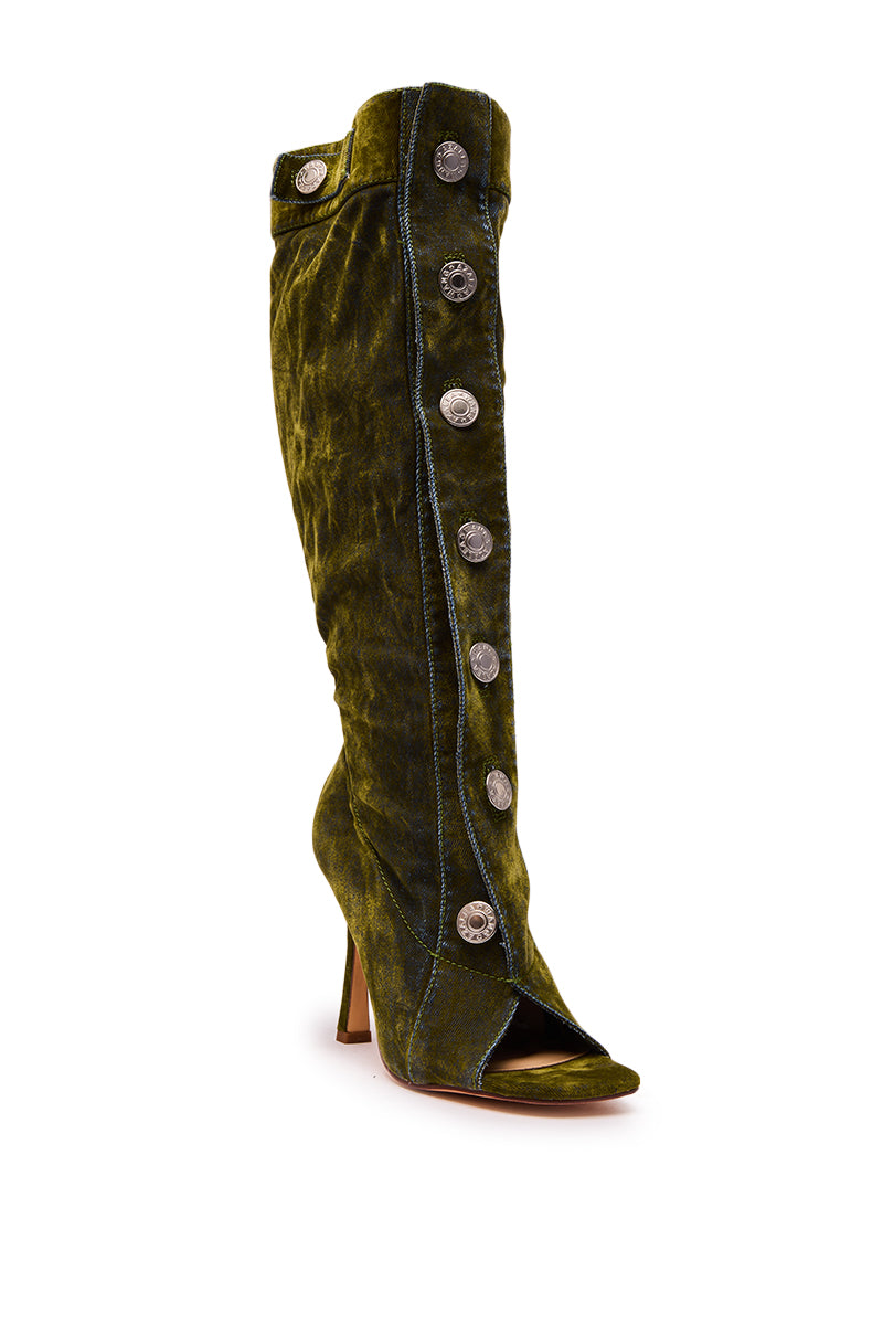 The AZALEA WANG KAZUKI OLIVE SLOUCHY DENIM BOOT is a knee-high, high-heeled olive boot featuring large silver side buttons and an open toe, shown against a white background.