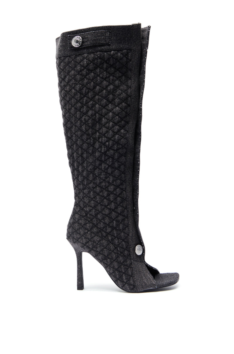 A black quilted knee-high stiletto boot with open toe, side buttons, a textured pattern, and flared stiletto heel inspired by the AZALEA WANG KAZUKI GREY QUILTED DENIM BOOT. 3