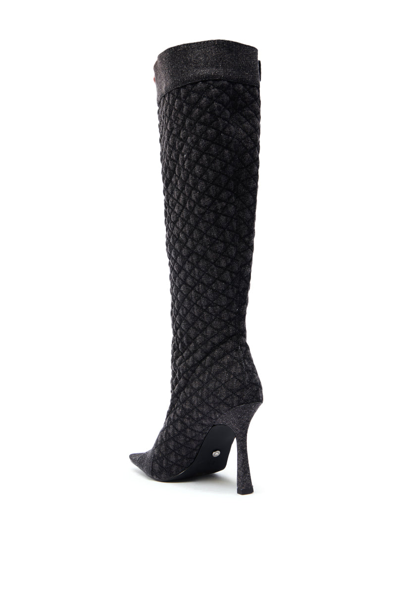The AZALEA WANG KAZUKI GREY QUILTED DENIM BOOT is displayed from the side, featuring knee-high length, a stiletto heel, and quilted denim texture against a white background. 5