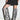 A person models the AZALEA WANG KENYA ZEBRA KNEE HIGH WEDGE BOOT with a black graphic t-shirt dress, standing against a plain white wall. Only the lower half of their body is shown.