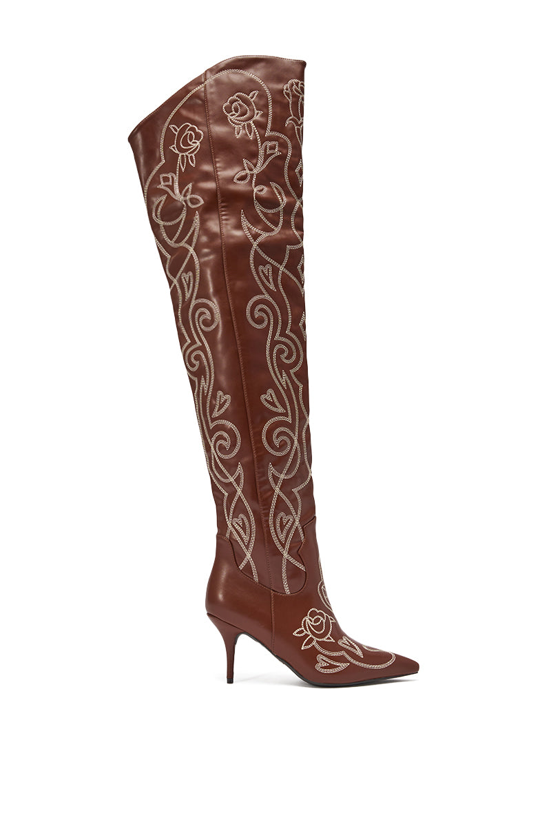 The AZALEA WANG KETA Brown Western Thigh High Stiletto Boot features a pointed toe, stiletto heel, and elaborate white floral and swirl embroidery along the shaft and foot. 3