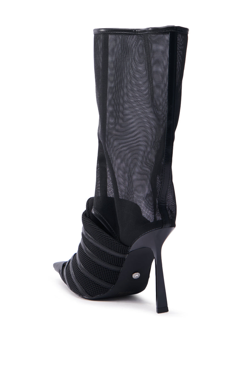 The AZALEA WANG ELLIS BLACK BOOTIE features a sheer mesh upper extending upwards, a pointed toe, and wrapped detailing around the ankle and foot for a sleek, modern look.