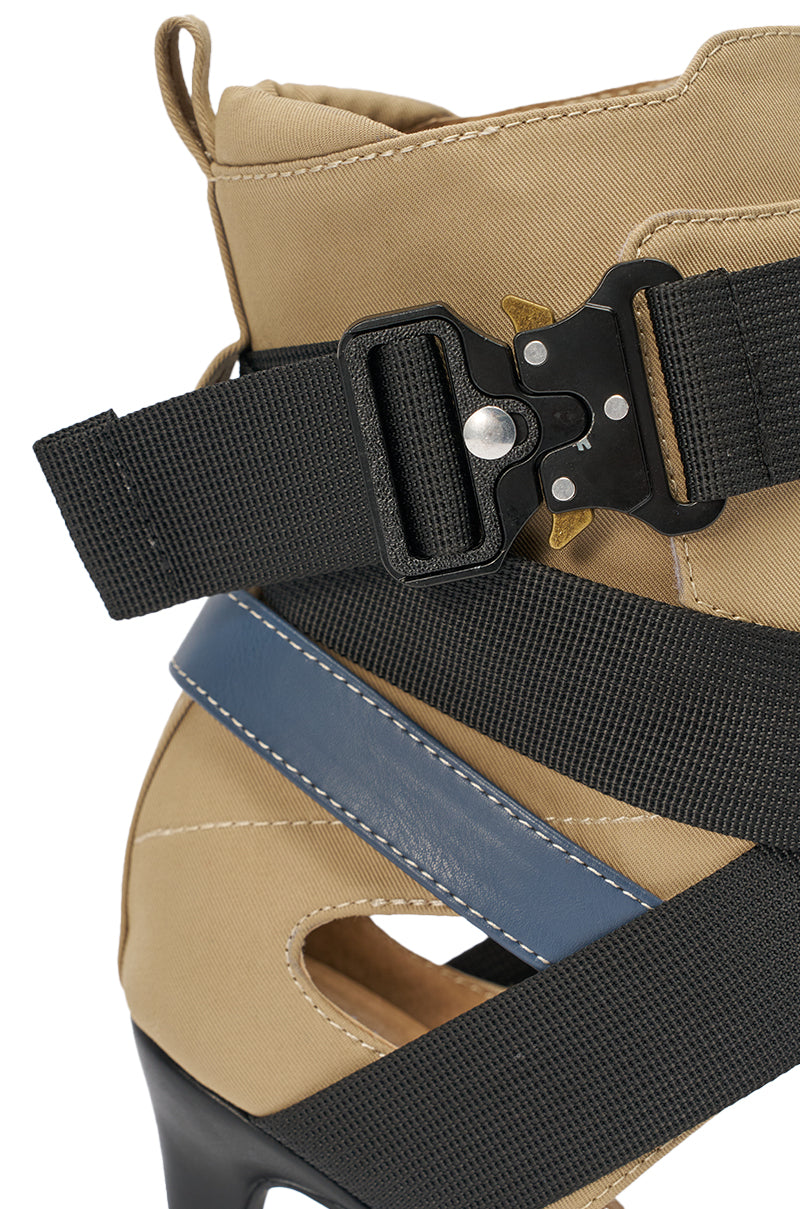 Close-up of the AZALEA WANG KIVA KHAKI STILETTO SPORTY SANDAL with wide black buckle strap, blue strap, crisscross elastic straps, detailed stitching, cut-outs, and a comfort cushion insole. 6