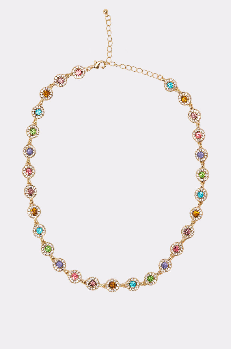 The ITS GIVING LUXURY CHOKER is a gold choker necklace adorned with round, multicolored gemstones in decorative settings and features an adjustable clasp with an extender chain for a perfect fit. 0
