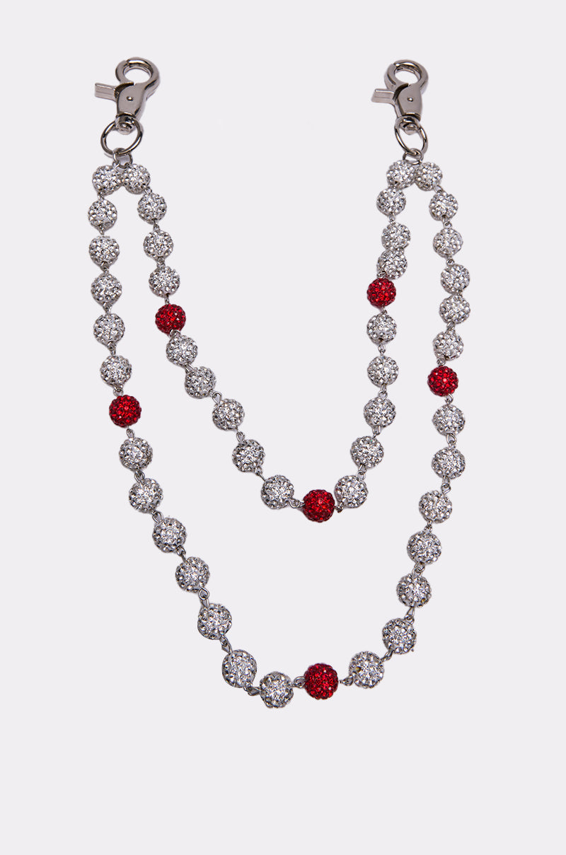 The BLING PANT & BAG CHAIN is a double-layered rhinestone chain with sparkling silver and red beads, finished with two metal clasps at each end and shown on a white background. 2