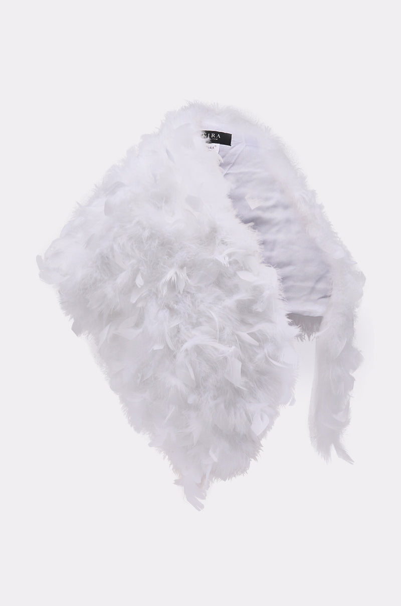 The TRUDY FEATHER WRAP is a vintage-inspired white feathered capelet with a fluffy, textured surface and satin-like lining, shown against a plain light background. 3
