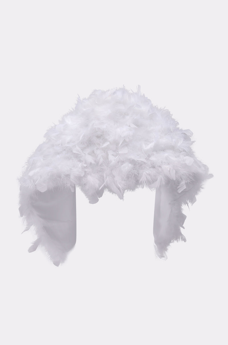 The TRUDY FEATHER WRAP features fluffy, white layered feathers that drape over the shoulders and arms, creating an angelic statement piece perfect for standing out against a plain light background. 5