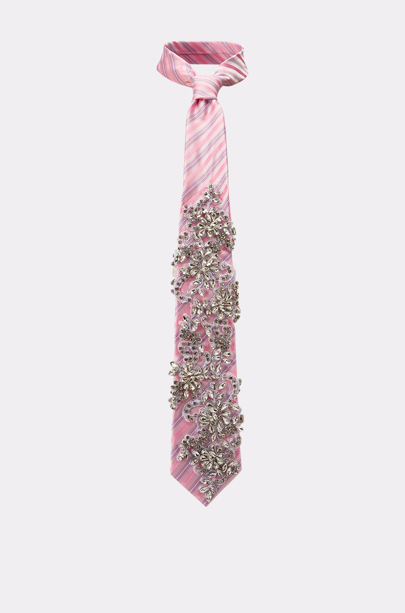 The FEMME APPLIQUE TIE features pink stripes with an ornate design, embellished with silver and clear rhinestones forming a jeweled pattern down the front. 1