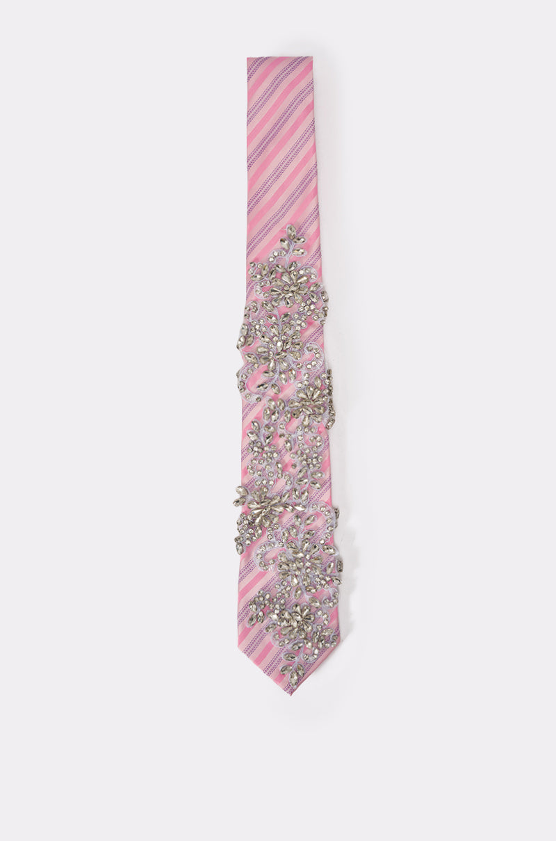 The FEMME APPLIQUE TIE is a pink striped necktie featuring intricate rhinestone and sequin floral embellishments along its length. 3