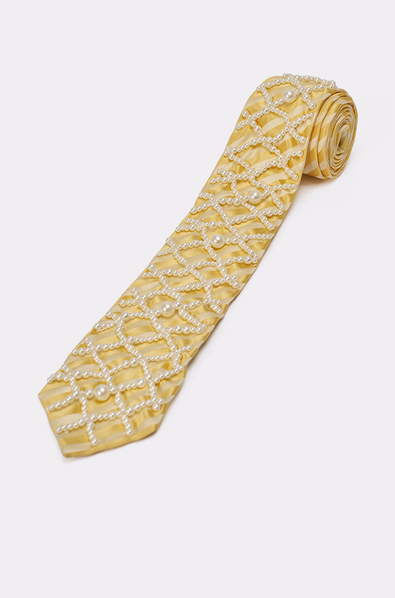 The FEMME APPLIQUE TIE features a butter yellow design with a crisscross pattern of pearl-like beads, offering an elegant look against a plain white background. 5