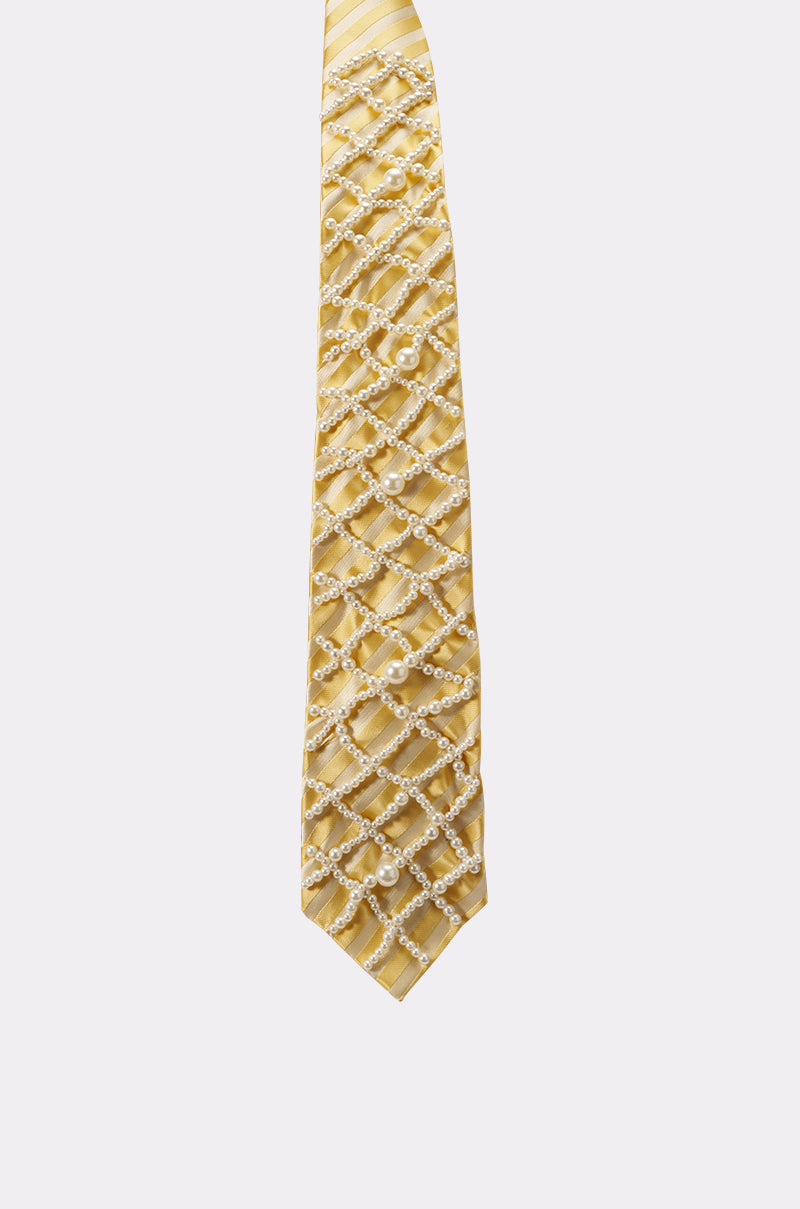 The FEMME APPLIQUE TIE features a butter yellow color with a striking lattice design created by a crisscross pattern of pearls on the front, set against a plain white background. 6