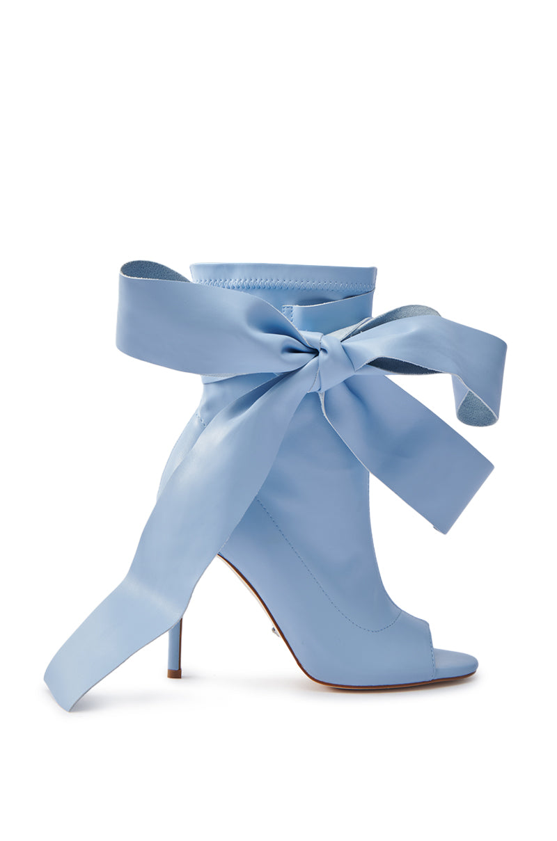 Meet the AZALEA WANG KLARICE BLUE OPEN TOE BOOTIE: styled with light blue faux leather, an eye-catching ankle bow, and a stiletto heel for a chic, contemporary look.