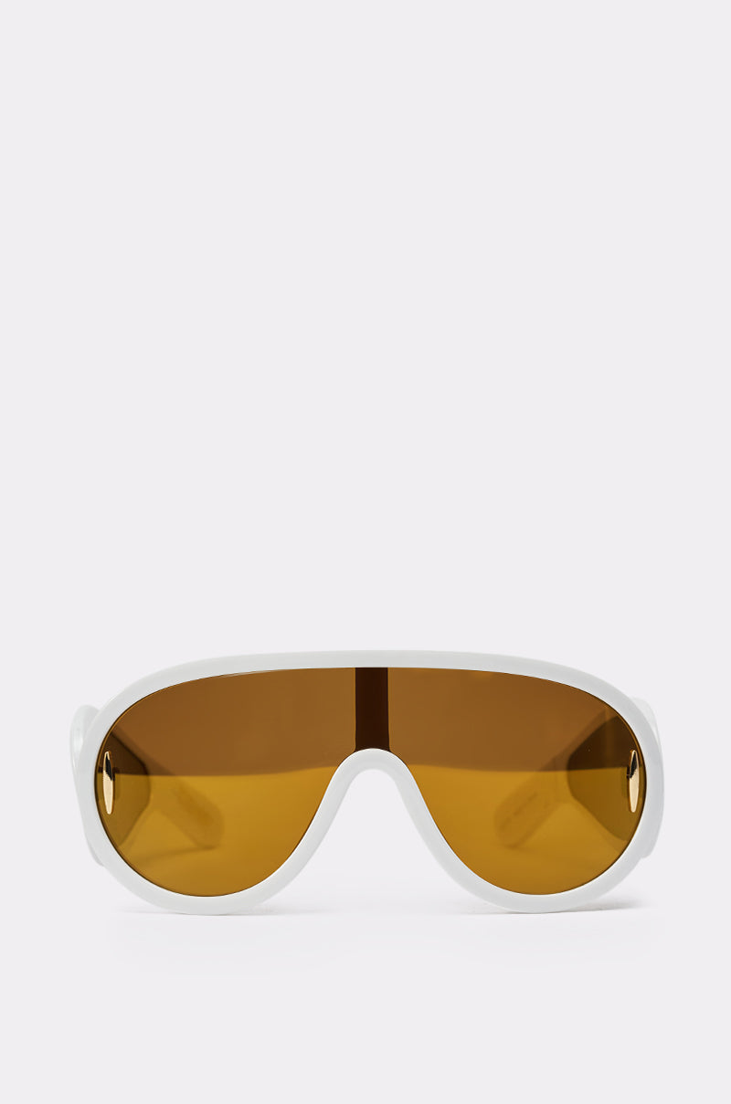 FEELIN GOLDEN SUNGLASSES featuring a white frame and large, single-piece amber mirrored lenses, showcased against a plain light background.