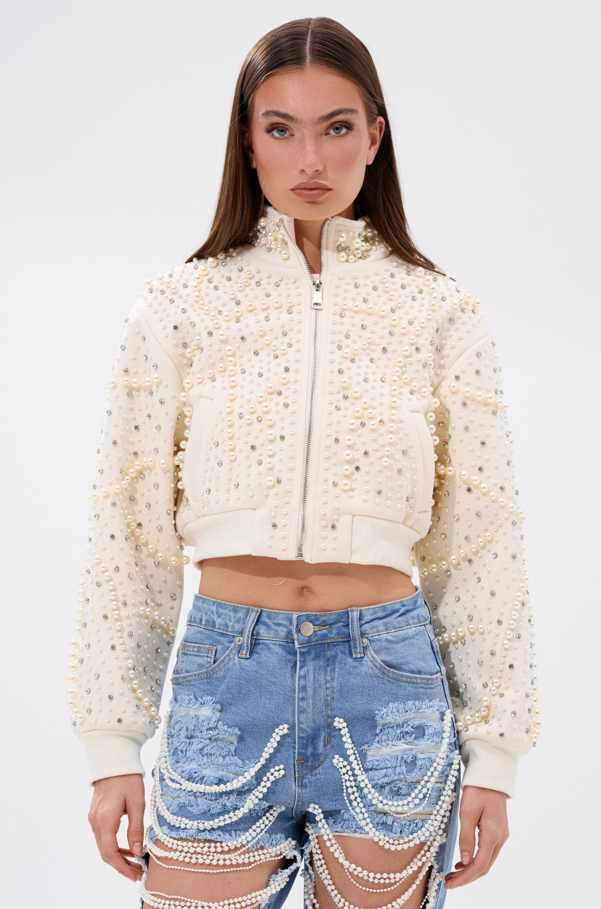 A woman in the GOODIE TWO SHOES EMBELLISHED BOMBER, featuring faux pearl rhinestone details. 2