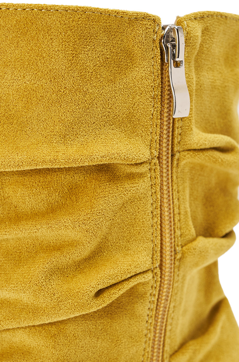 Close-up of the AZALEA WANG KYVELISA Mustard Wedge Open Toe Bootie in faux suede with a textured finish, ruched detailing, and a vertical silver zipper on the side. 6