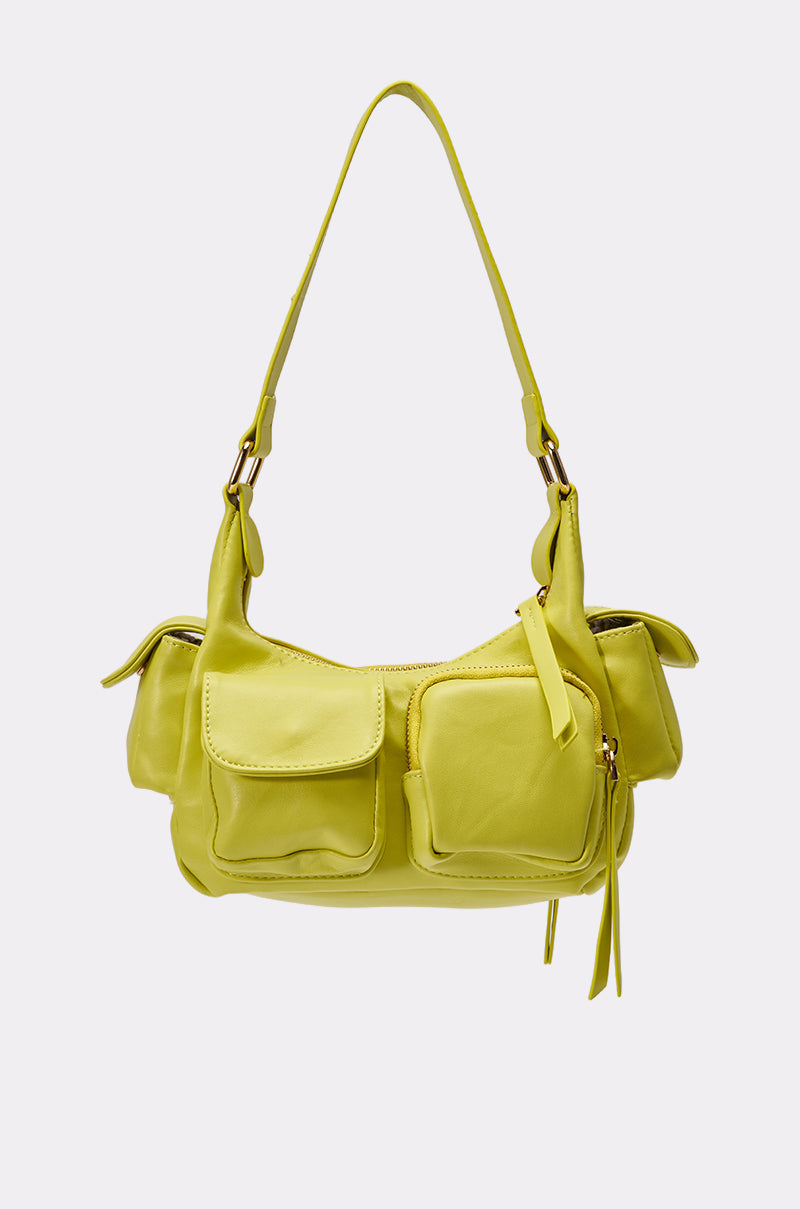 The LIFE GIVES YOU LEMONS PURSE is a neon yellow faux leather shoulder bag featuring two utility front flap pockets, zippered side pockets, and an adjustable strap, showcased on a plain light background. 2