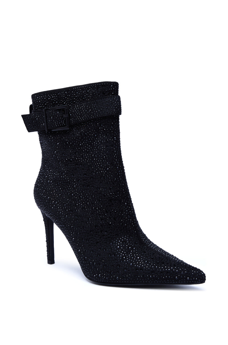 The AZALEA WANG LAKSHMI Black Sparkle Rhinestone Stiletto Bootie features a pointed toe, high heel, sparkling rhinestones, and a decorative side buckle strap for extra flair.