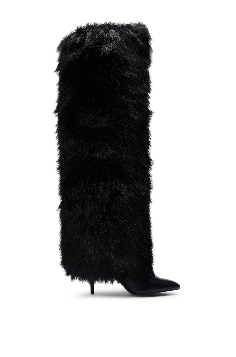 The AZALEA WANG LANGLEYE BLACK THIGH-HIGH FUR LUXE BOOT is a tall, black pointed-toe stiletto covered entirely in thick, shaggy faux fur for a bold, luxe look.