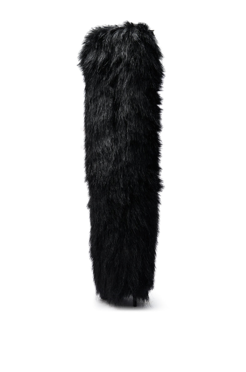 The AZALEA WANG LANGLEYE Black Thigh-High Fur Luxe Boot stands upright, its tall cylindrical silhouette of black faux fur displayed against a plain white background.