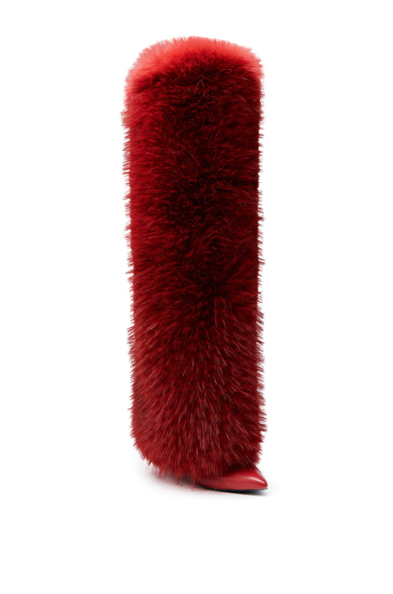 The AZALEA WANG LANGLEYE RED THIGH-HIGH FUR LUXE BOOT features a tall, stiletto-heeled design covered in plush red faux fur, with only the pointed toe and sole exposed.