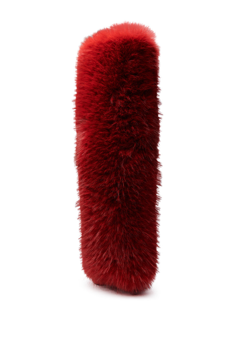 The AZALEA WANG LANGLEYE RED THIGH-HIGH FUR LUXE BOOT, tall and rectangular with bright red faux fur, stands upright against a white background.