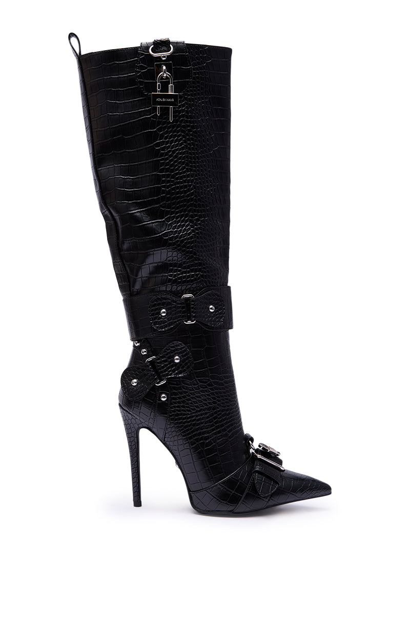 The AZALEA WANG LAPIS BLACK SNAKE STILETTO BOOT features a pointed toe, faux-crocodile texture, metal buckles, and stylish ankle and calf straps—perfect for making a bold statement.