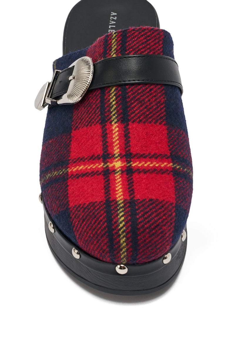 The AZALEA WANG LATIFAH RED PLAID CHUNKY HEEL MULE showcases wool-like red and navy plaid fabric, a black leather strap with silver buckle, cushioned insole heel, and silver stud accents along the black sole. 6