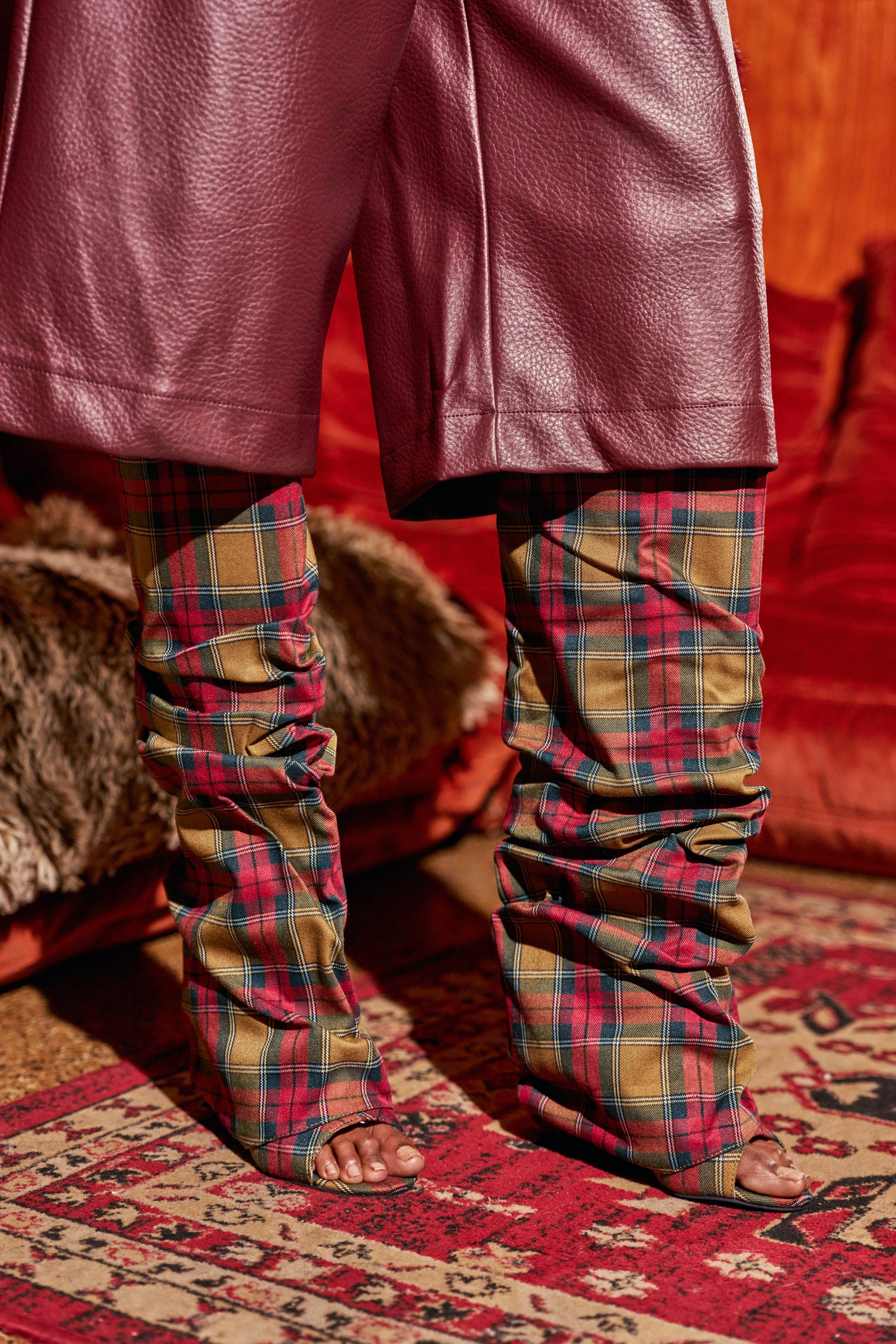 AZALEA WANG LAVINIA PLAID SLOUCHY WEDGE BOOT in a red, green, and tan plaid pattern with a slouchy, open-toe design, perfect for fall streetwear.