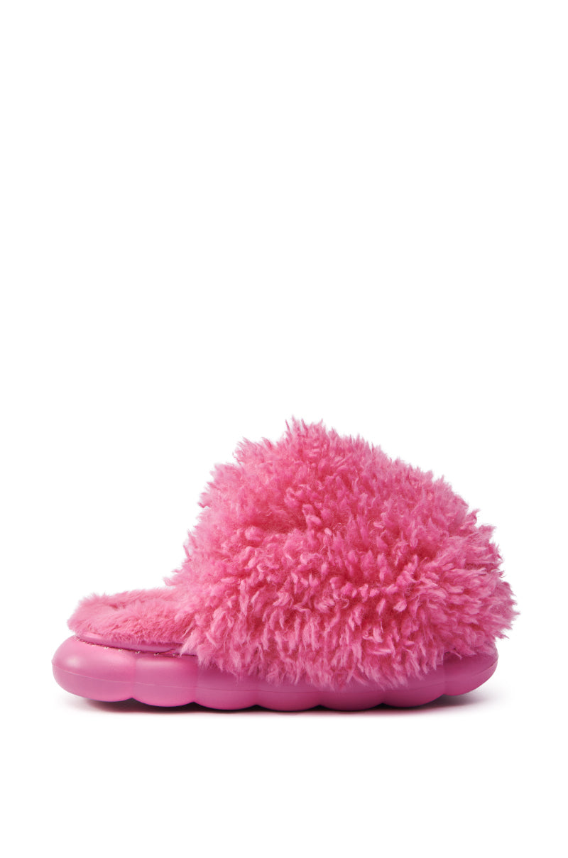 The AZALEA WANG LAWSON PINK SLIPPER, with a bright pink faux fur upper and cushioned sole, is shown from the side on a plain white background.