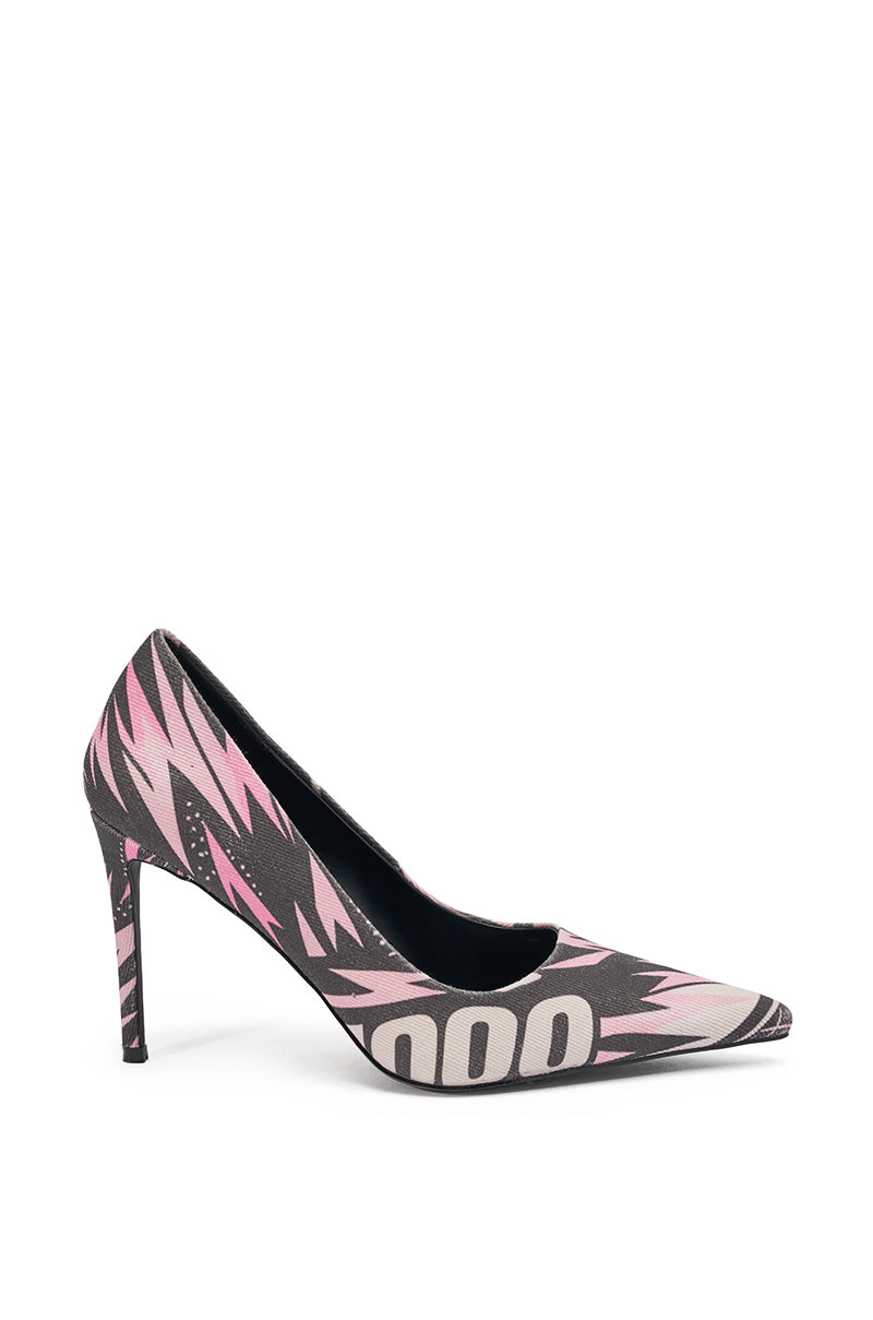 The AZALEA WANG SPORT PRINTED STILETTO POINTED TOE PUMP features a high heel, pointed toe, bold pop-art print in black, pink, and beige with graphic patterns and abstract lettering, plus a cushioned insole for stylish comfort. 2