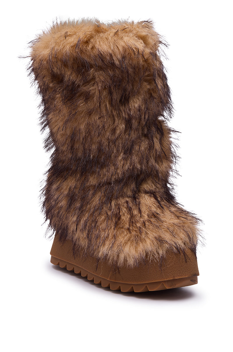 The AZALEA WANG LEOPOLD BROWN MULTI FLAT FUR BOOT features a thick, fluffy faux fur exterior and a chunky, ridged platform sole, displayed as a single boot on a white background.