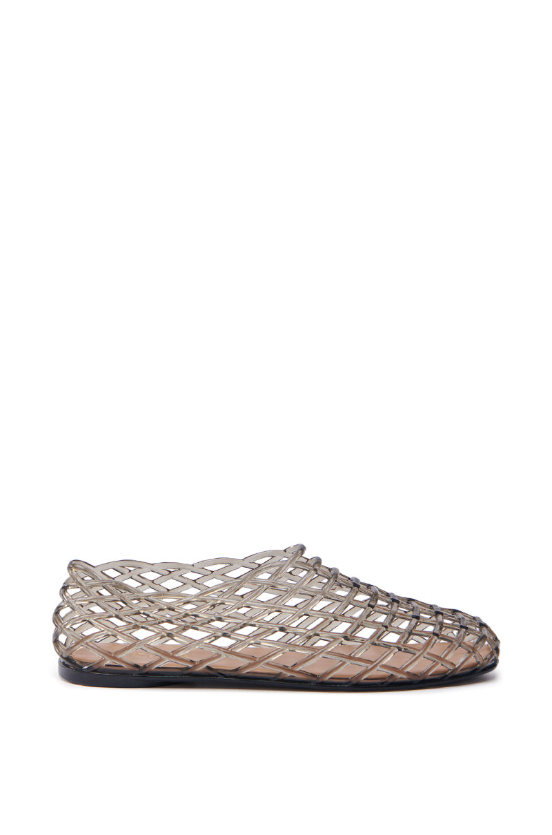 The AKIRA LINUS BLACK FLAT is a clear PVC jelly shoe with a lattice design, featuring a flat sole and slightly raised heel for subtle elevation. It's presented on a white background.