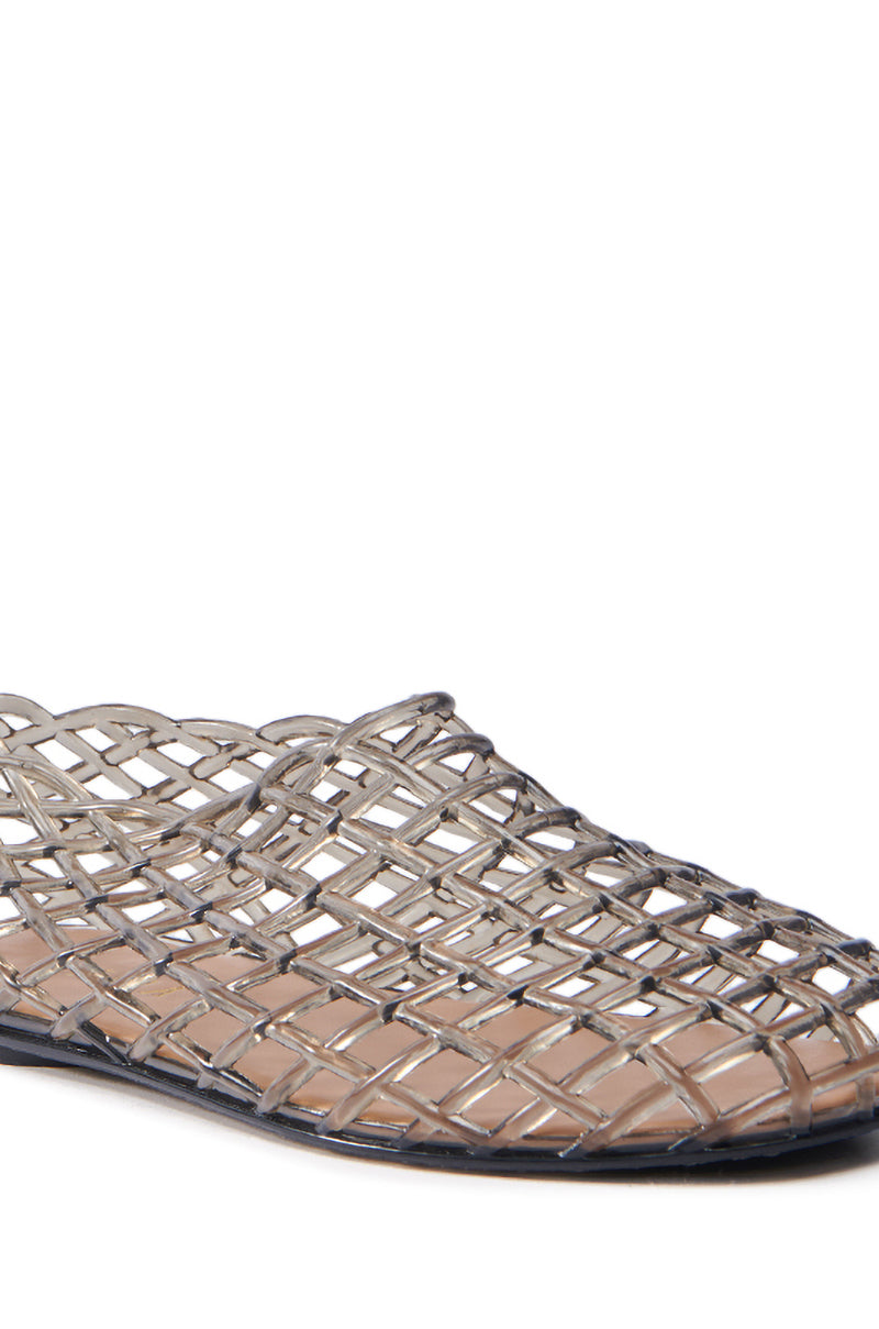 Close-up of the AKIRA LINUS BLACK FLAT featuring an intricate metallic lattice design and elegant almond toe. The crisscross pattern reveals a beige background, offering a modern, artistic style perfect for those who appreciate unique craftsmanship.