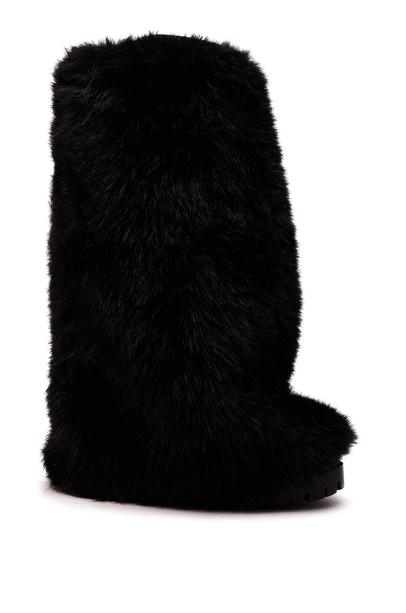 The AZALEA WANG LISBOA BLACK FUR FOLD OVER BOOT is a single mid-calf, black fur boot with a thick, fluffy texture and a flat, ridged sole, displayed in profile against a white background.