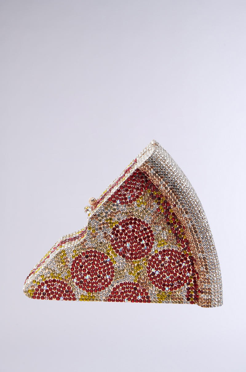 The GRAB A SLICE RHINESTONE PIZZA CLUTCH is a novelty handbag designed like a pepperoni pizza slice, embellished with red, yellow, and clear sparkly gems in a triangular shape.