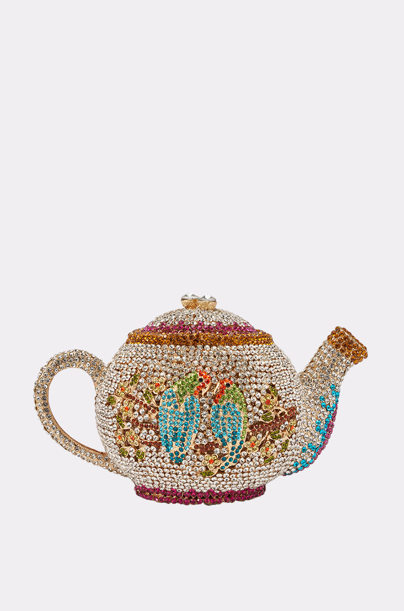 The WHATS THE TEA BLING PURSE is a jeweled teapot-shaped bag with colorful rhinestones, twin peacocks, blue spout, gold handle, and floral accents—an ideal statement accessory for an evening party. 2