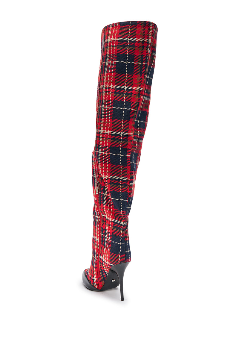 The AKIRA GOLD LOCHANA Multi Plaid Flannel Sexy Boot is a tall, pointed-toe stiletto heel boot in bold red and black plaid, shown from the back on a white background.