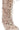 The AZALEA WANG LOURDANNE IVORY FUR LACE UP BOOT features beige faux fur, cream laces through metal eyelets, and two small buckle straps near the ankle.