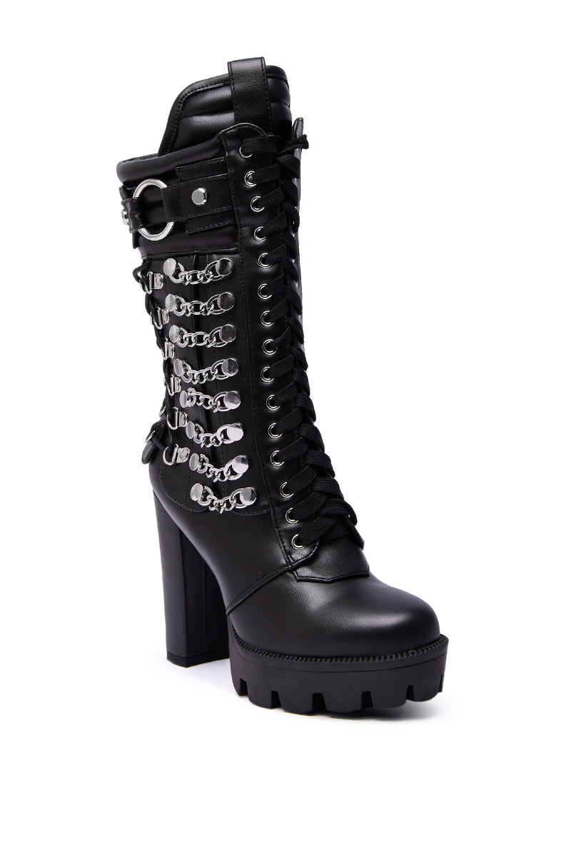 The AZALEA WANG LUUK Black Metal Hardware Embellished Chunky Bootie features faux leather, front laces, silver chain details, and bold metal hardware for an edgy gothic look.