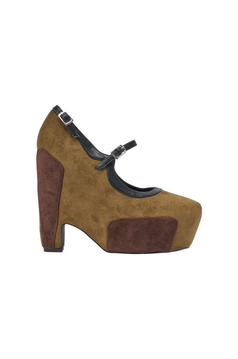 The AZALEA WANG LYTHA OLIVE MARY JANE PUMP features brown and dark brown suede, double black buckle straps, a platform sole, thick high heel, and is shown in profile on a white background. 4